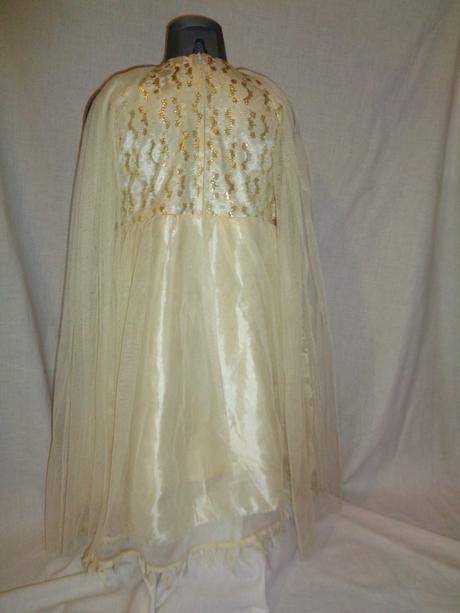 Krásné společenské šaty v barvě šampáňo, 128