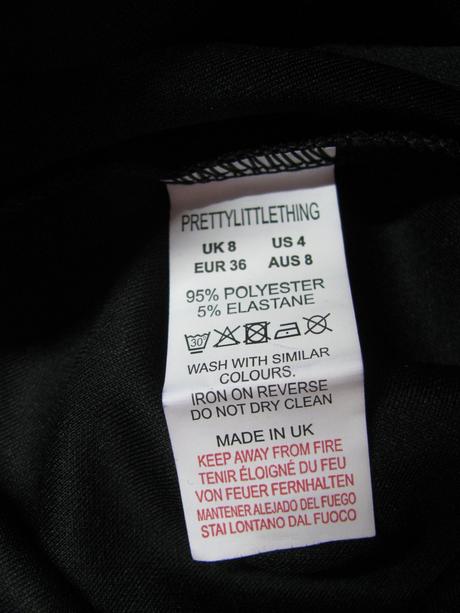 Černé elastické tepláky s légou, 36