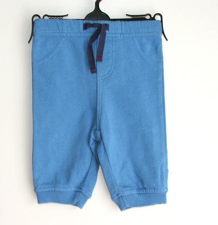 W85 modré tepláky vel. 62, m&co,62