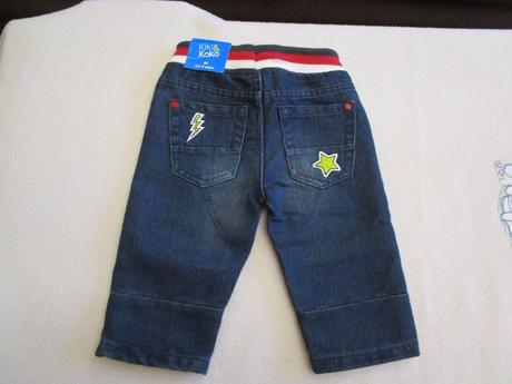 Nové tm. modré rifle s nášivkami, vel. 92, kik,92