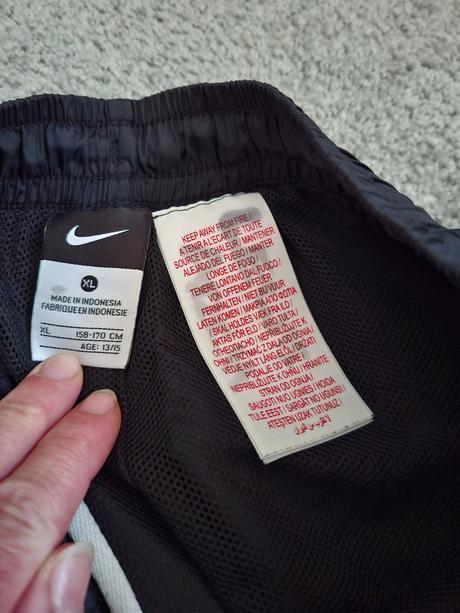 Šusťákové kalhoty, nike,164