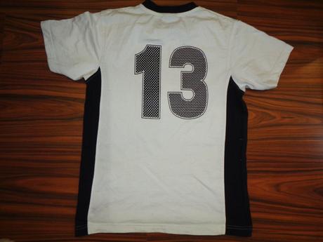 Bíločerné tričko se třináctkou, 164