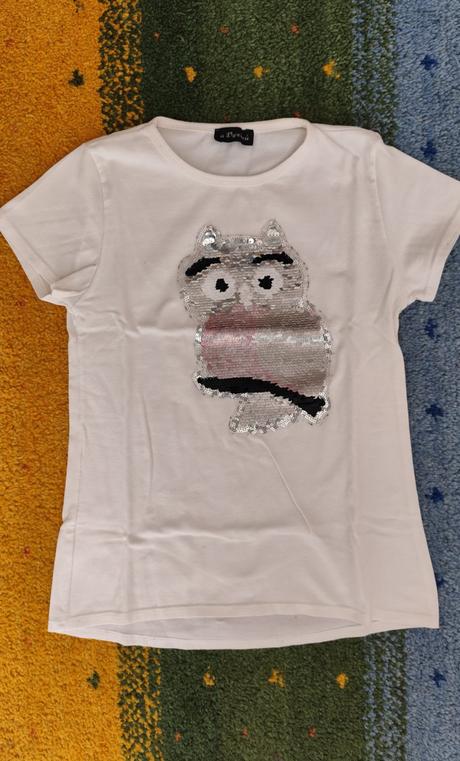 Bíle triko se sovou, 146