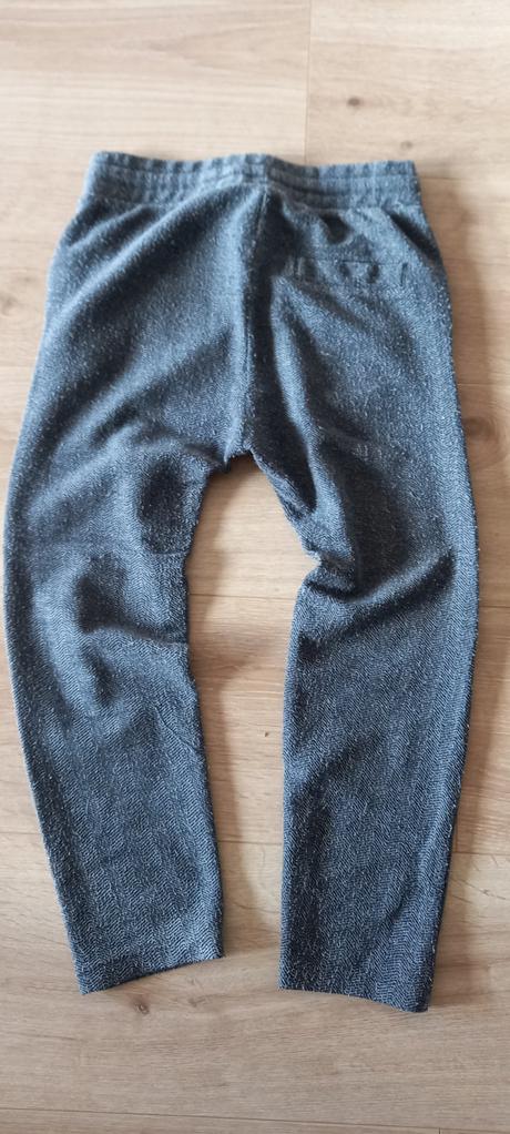Tepláky zn. lindex vel. 134 se sníženým sedem, lindex,134
