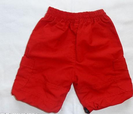 G244. červené kraťasy, 74