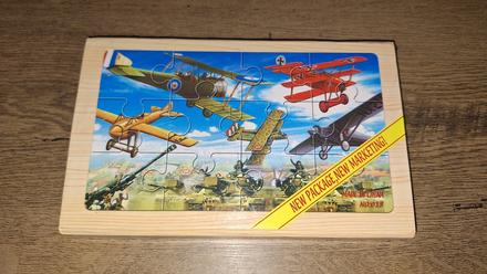 Dřevěné puzzle letadla v krabičce -4 motivy,