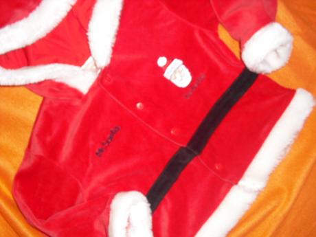 Nádherný santíkový kabátek, 92