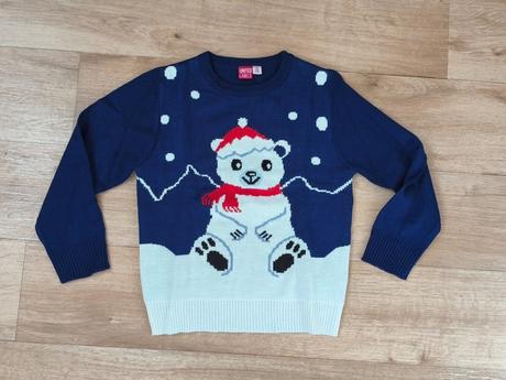 Svetr s ledním medvědem, 122
