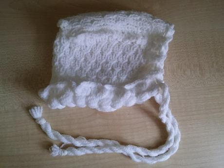 Kojenecká čepička, 56