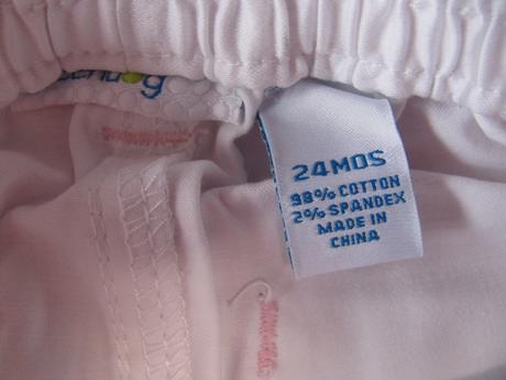 Bílé sváteční elastické 7/8 kalhoty s mašlí, 92