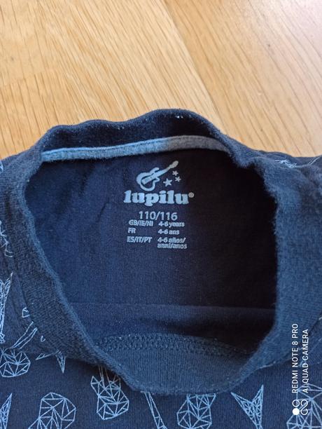 Černé triko s kytarami, lupilu,110