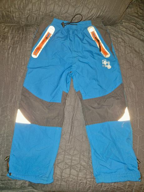 Zimní modré zateplené kalhoty zn. kugo vel. 116, kugo,116