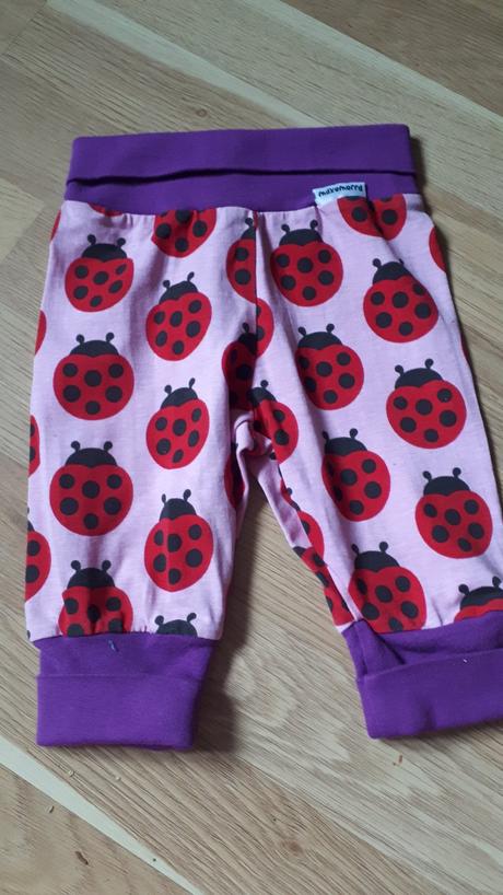 Tepláky s berušky, 68