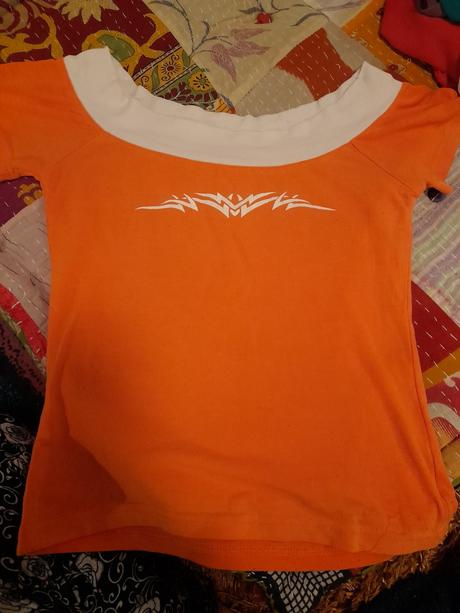Oranžové tričko zdarma, 152