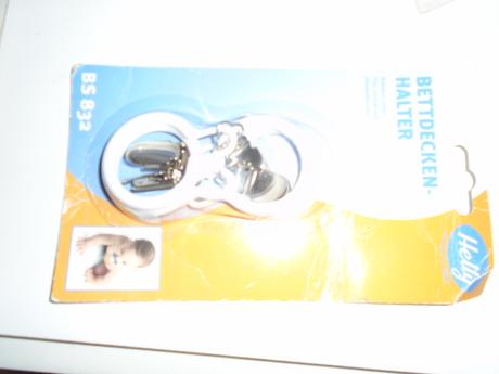 Držáka peřinka miminka proti odkopání, 