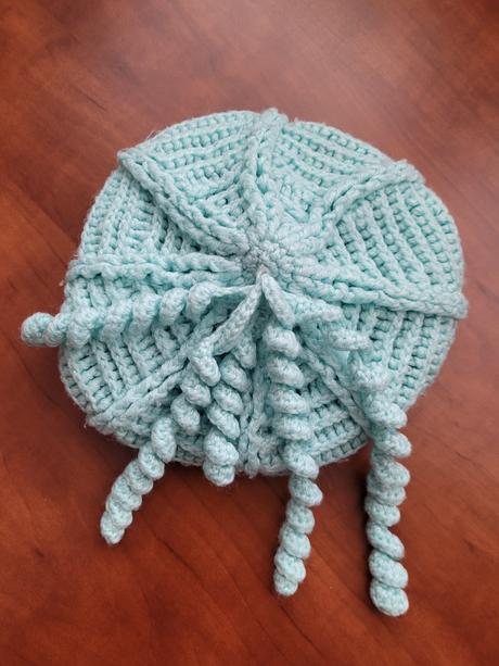 Zelinkavá čepice, 110