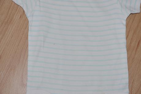 Bile body s modrymi prouzky, 86