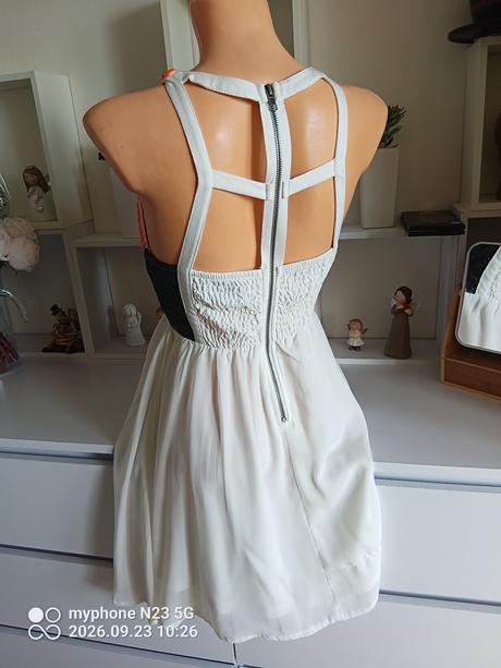 Šaty zn."xenia boutique" vel."8",