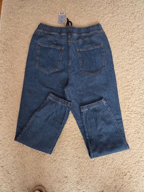 Nenošené světlejší pánské džíny "jogger", 52