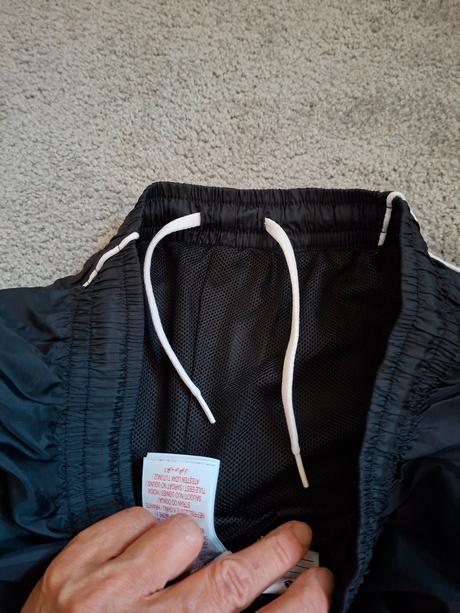 Šusťákové kalhoty, nike,164