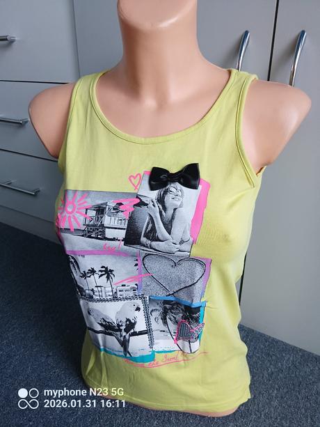 Tílko žluté zn."here+there c&a" vel."146-152", c&a,146