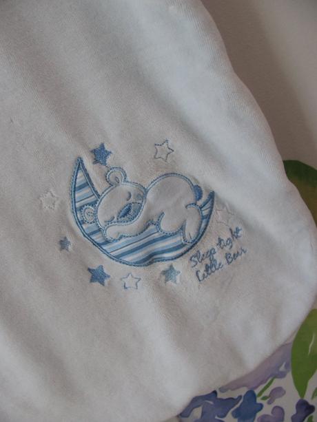 Světle modrý velurový spací pytel vel.0-6 měs., early days