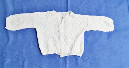 Kojenecký svetřík, 56