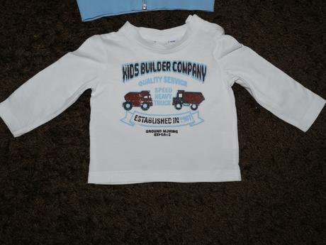 Mikca na zip a triko, 74